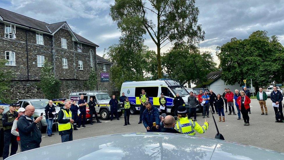 Lake District rangers and volunteers being briefed