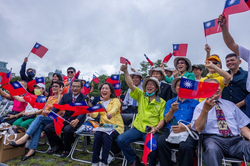 People cheer during Taiwan National Day on October 10, 2023 in Taipei, Taiwan.