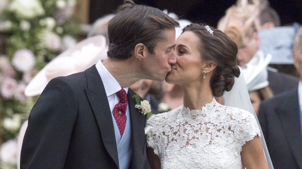 James Matthews and Pippa Middleton kiss after their marriage