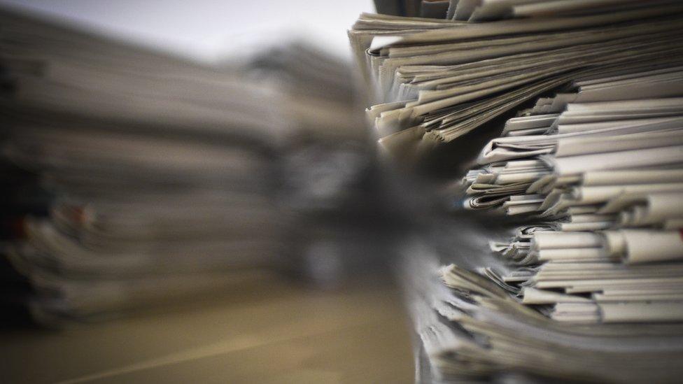 A stack of newspapers