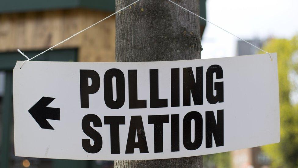 File photo of a sign indicating a polling station.