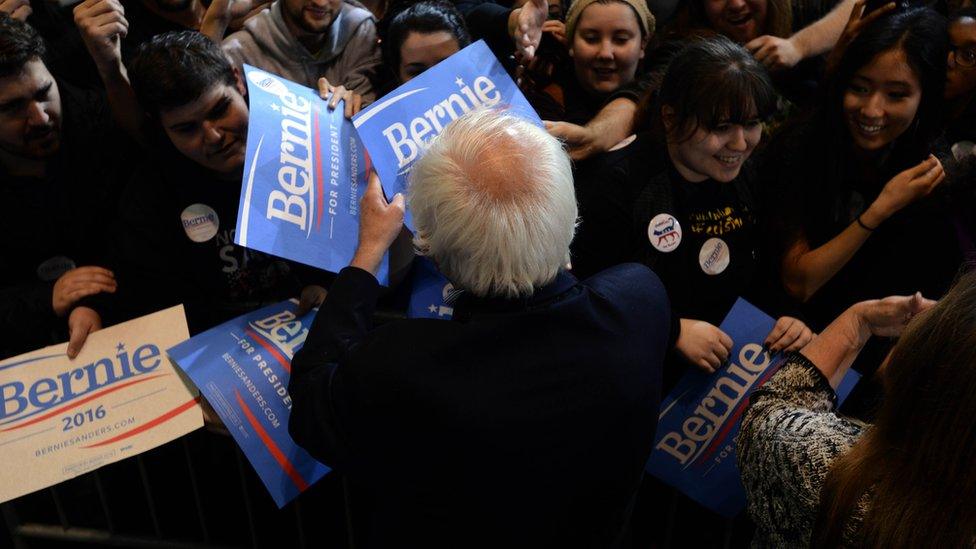 Democratic Presidential candidate Bernie Sanders signs autographs with supporters following a rally at the Boston Convention and Exhibition Center October 3, 2015 in Boston, Massachusetts.