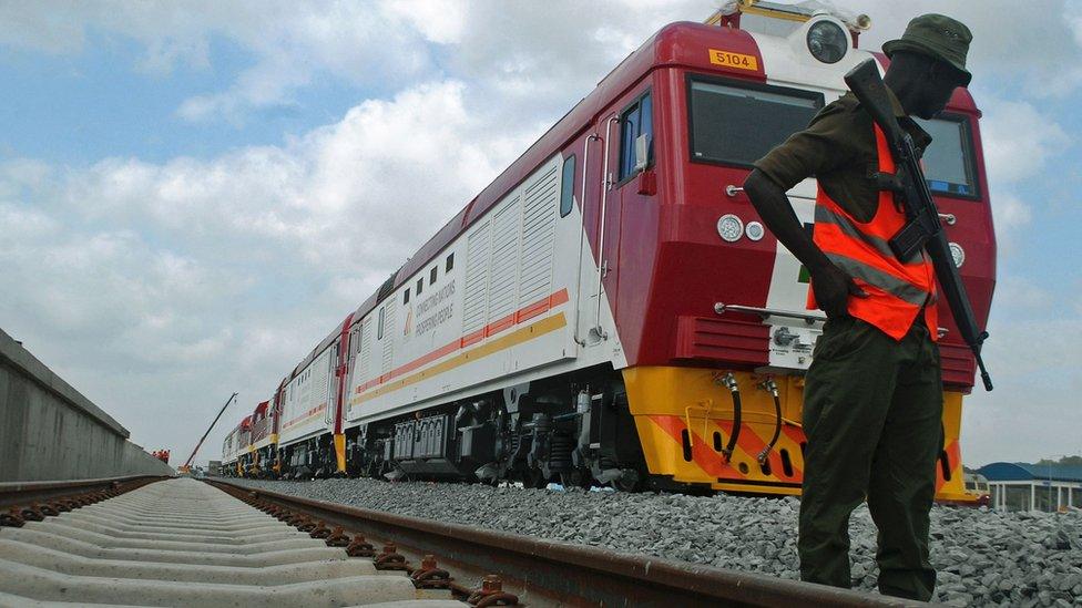 A security guard on patrol during launch of the first batch of Standard Gauge Railway freight locomotives at the port in Mombasa, Kenya on Wednesday, 11 Jan.