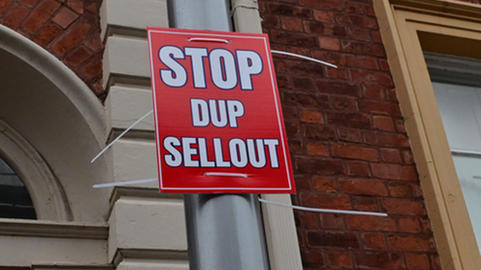 Poster outside the constituency office of Sir Jeffrey Donaldson