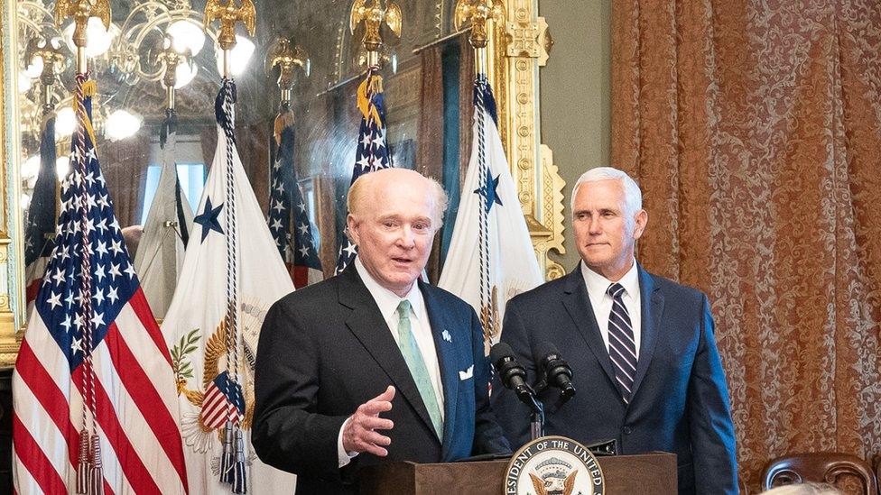 Mr Crawford with Vice-President Mike Pence as his swearing-in ceremony