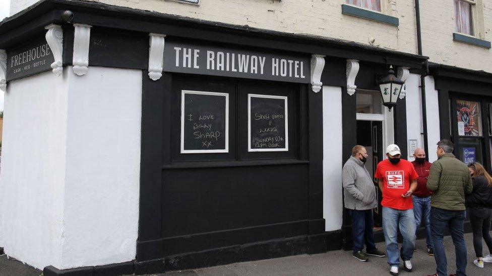 People outside pub in Sheffield