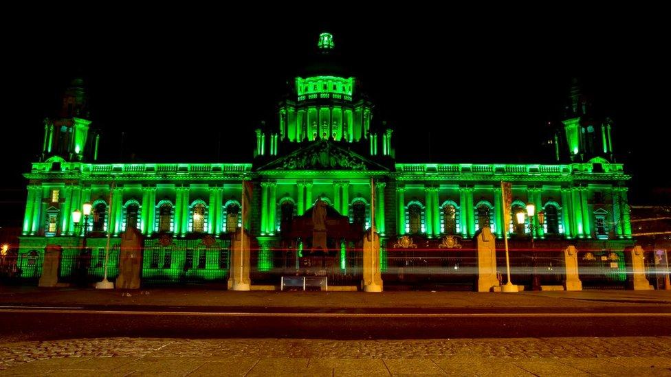 Belfast City Hall in Northern Ireland glowed green ahead of a day of celebrations in the city