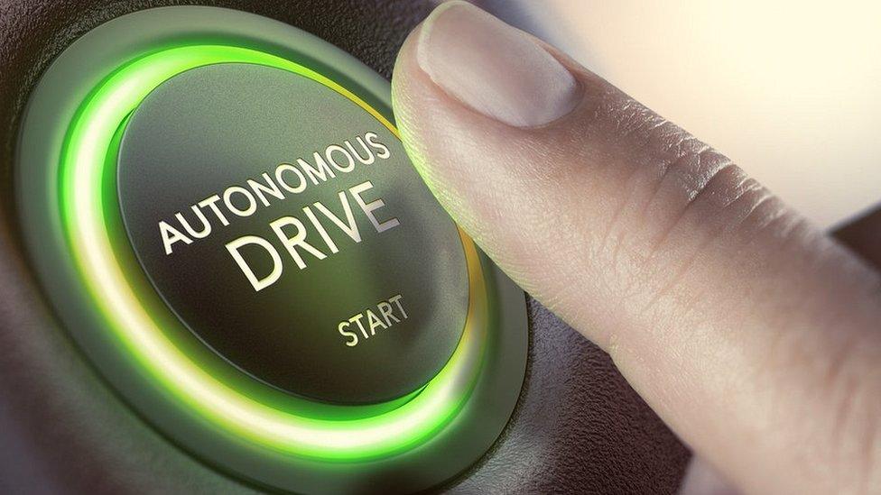 Graphic of autonomous drive button in car