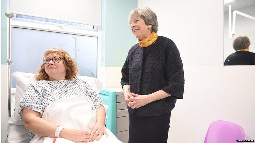 Theresa May during a visit to a Surrey hospital earlier this month