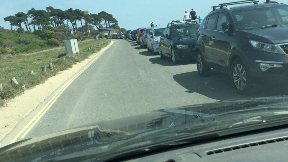 Cars parked at Lepe Beach