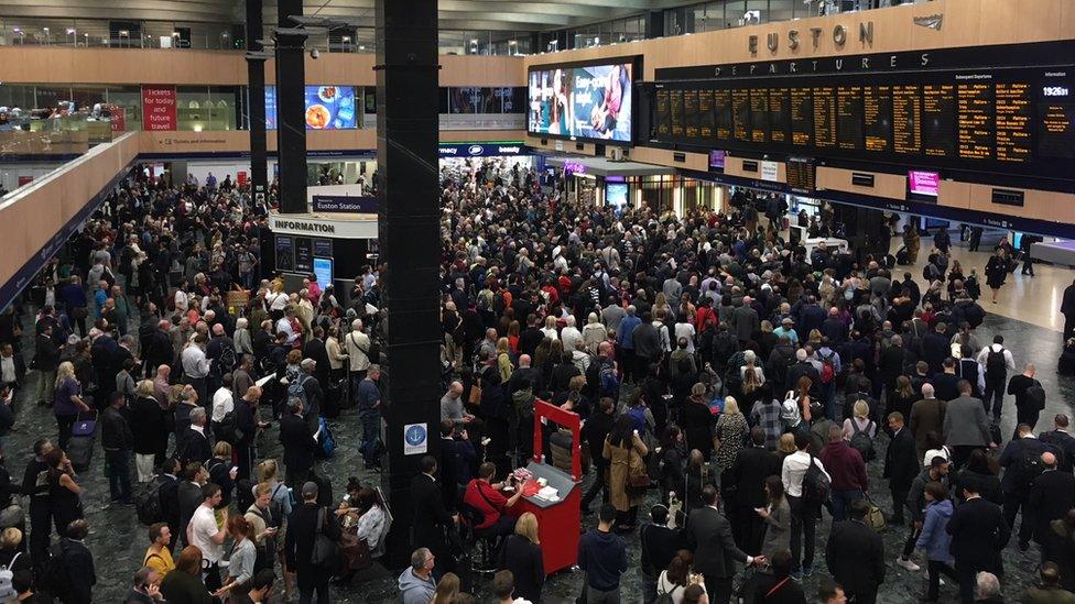 Commuters on the concourse at Euston station