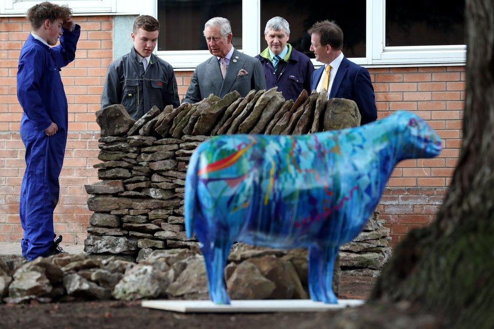 Prince Charles at the Applied Learning Centre at the Ullswater Community College in Penrith, during a day of visits to Cumbria, three months after he visited flood-hit communities in the wake of Storm Desmond.