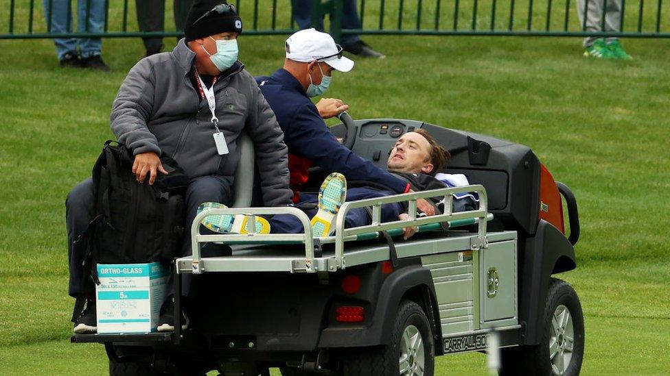 Tom Felton is carted off the course after collapsing during the celebrity matches ahead of the 43rd Ryder Cup at Whistling Straits