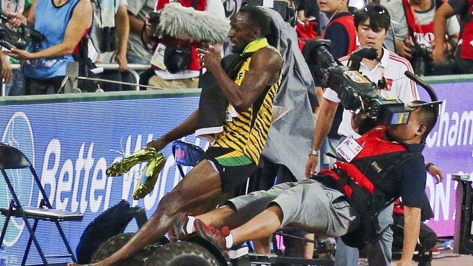 Sprinter Usain Bolt colliding with a cameraman on a Segway in 2015.