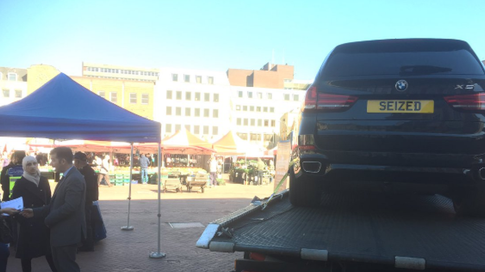 A seized BMW X5 on display in Northampton's market square