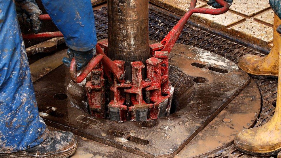 Engineers at work on the drilling platform of the Cuadrilla shale fracking facility on October 7, 2012 in Preston, Lancashire.