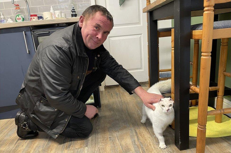 Dave Whitehouse with the cat