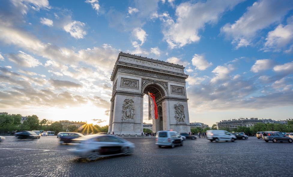 Arc de Triomphe surrounded by traffic