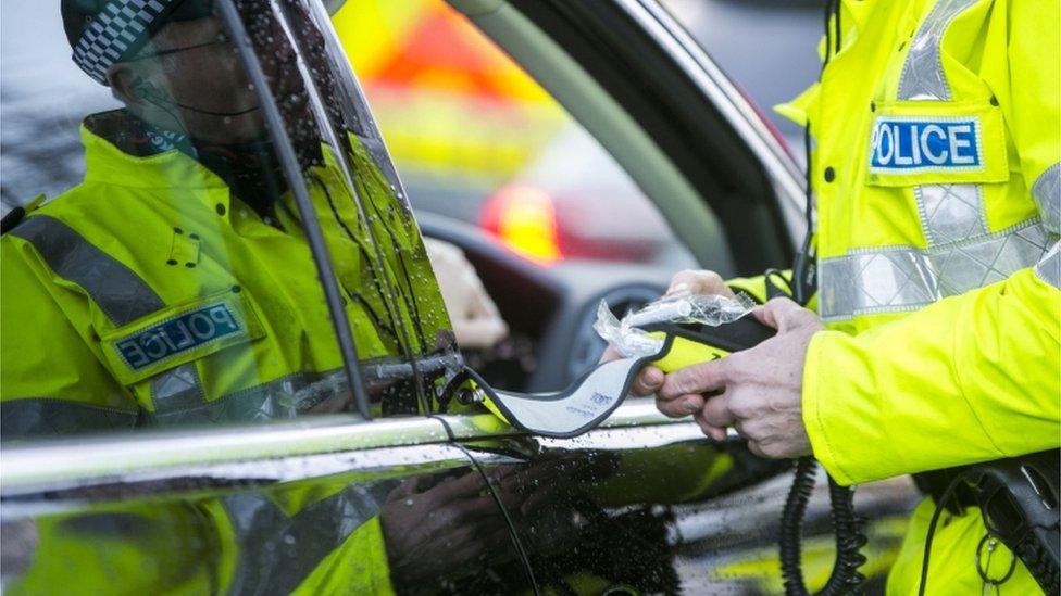 Police officer with breath test