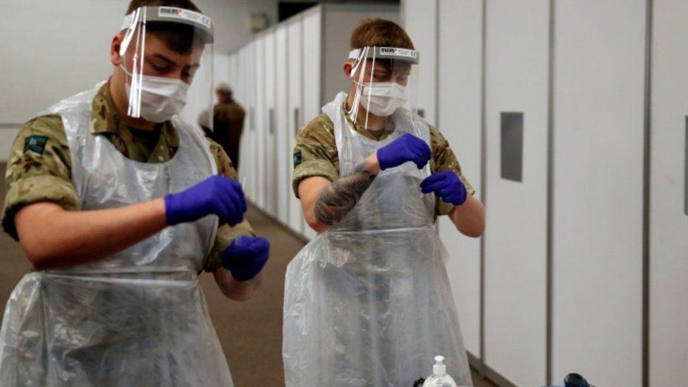 Military personnel help with covid testing in Liverpool