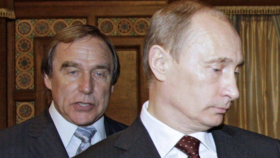 Sergei Roldugin (L) and Vladimir Putin, pictured in 2009