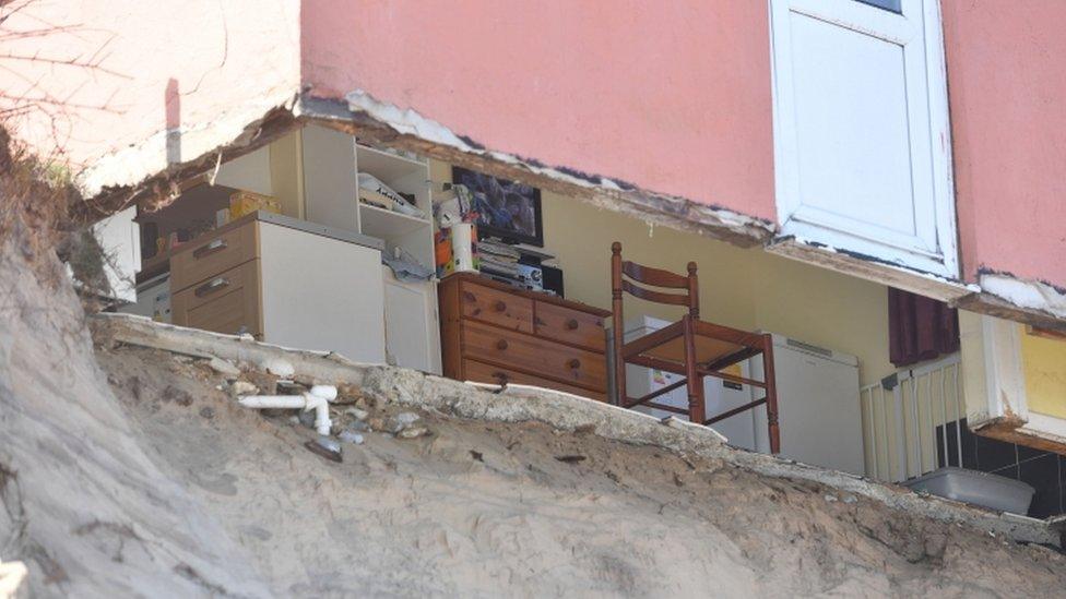 Exposed rooms at cliff-edge house