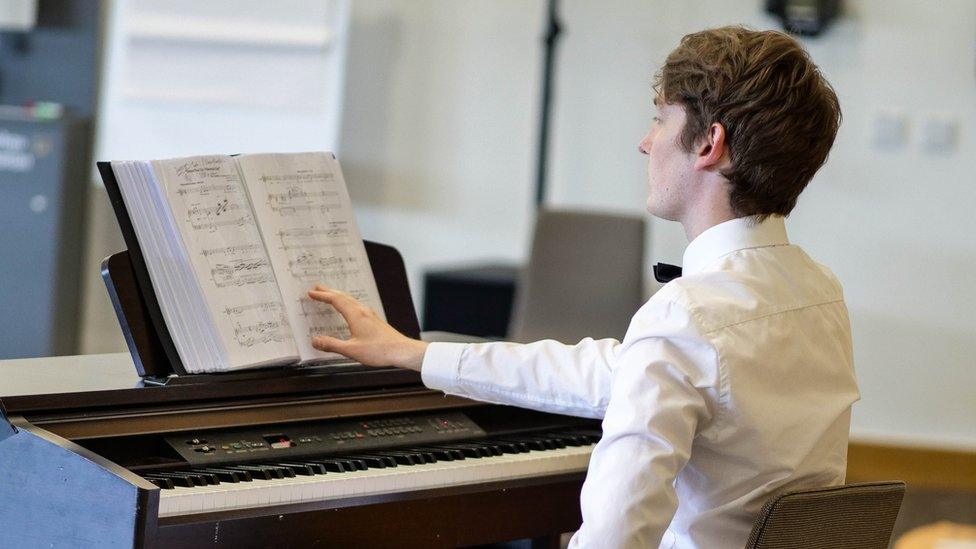 David George Harrington at the piano during rehearsals