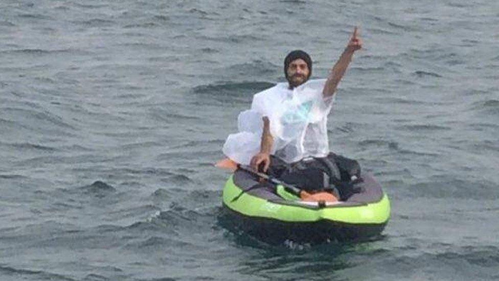 Migrant on board a kayak