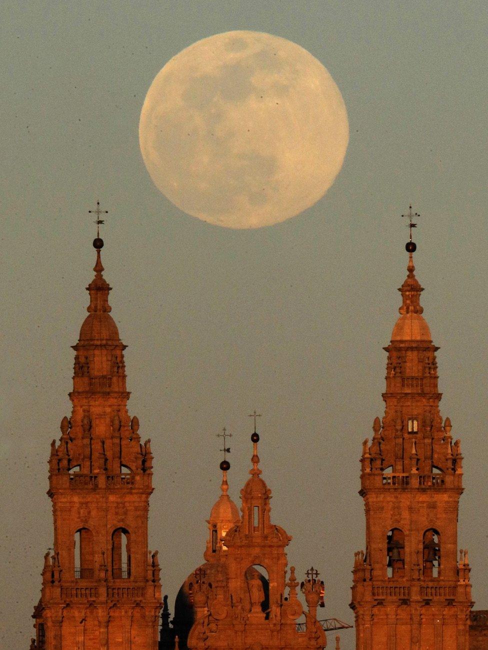 A view of the supermoon over the Santiago de Compostela cathedral in Spain