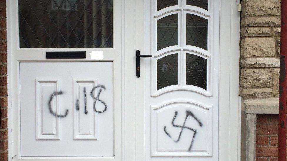 Religiously aggravated graffiti on a door in Northern Ireland