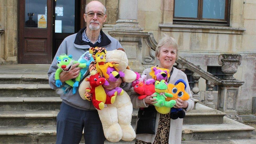 Roy and Ann Pettitt with a number of toys