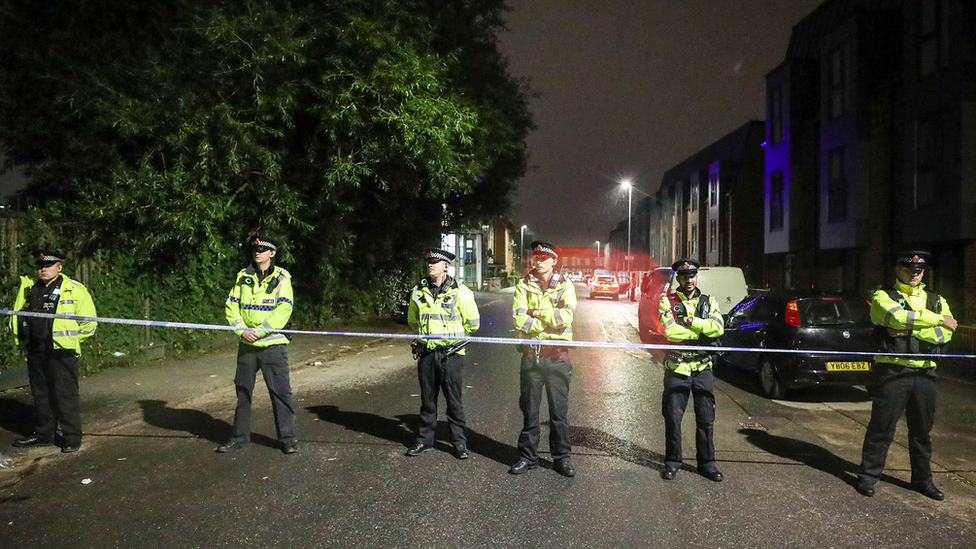 Policemen at cordon