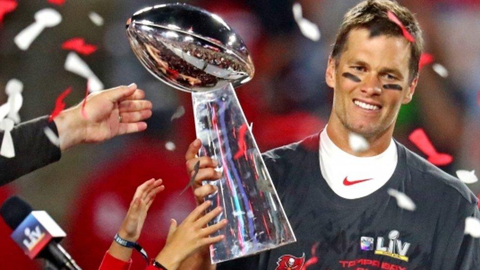 Tom Brady lifts the Vince Lombardi Trophy after winning Super Bowl 55 with the Tampa Bay Buccaneers