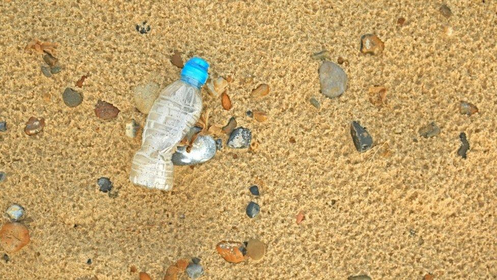 Plastic bottle on beach