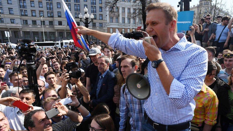 Alexei Navalny addresses supporters at an anti-Putin rally in Moscow