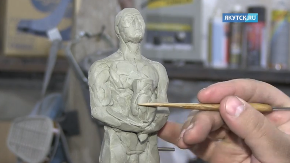 A sculptor works on the planned award for Leonardo DiCaprio