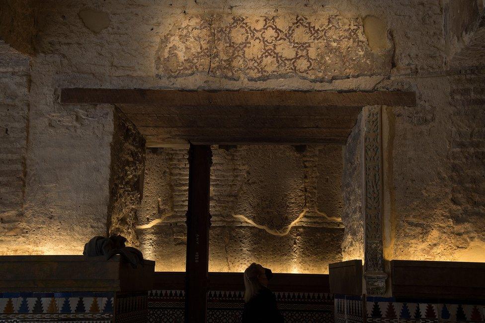 The walls of the hammam are covered with Moorish tiles