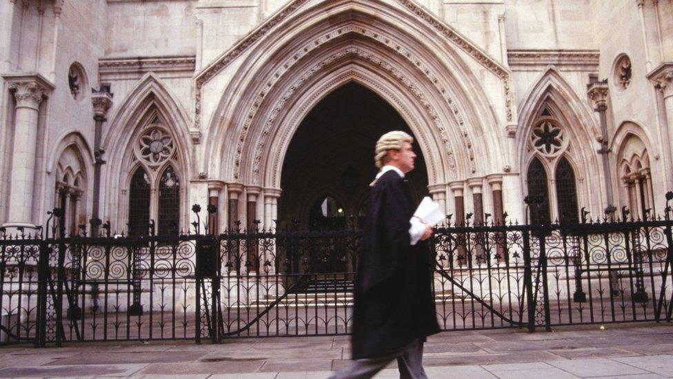 A barrister outside the Royal Courts of Justice