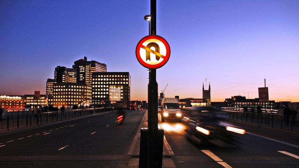 A no U-turn road sign on London bridge