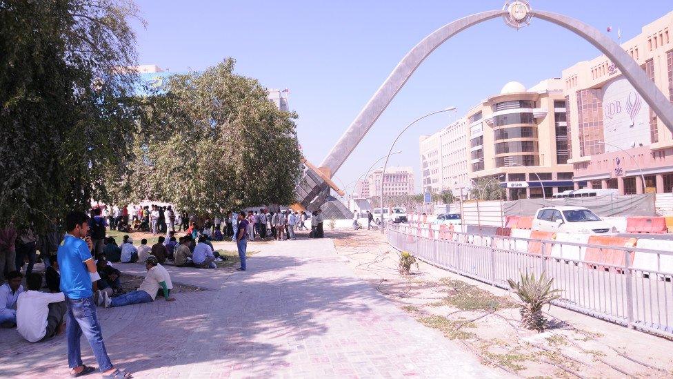 Nepali workers gather at Tarbar Gate in Qatar