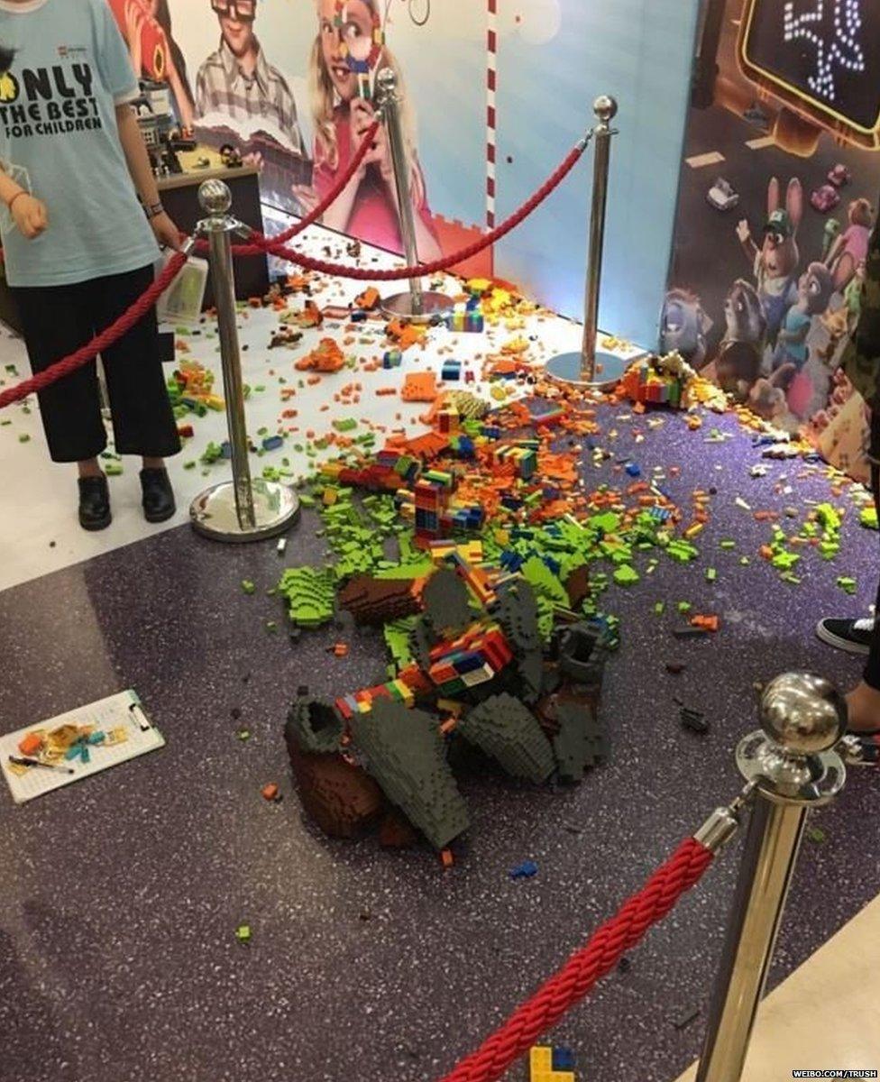 Photo of broken statue of Nick from the film Zootopia at the LEGO expo in China.