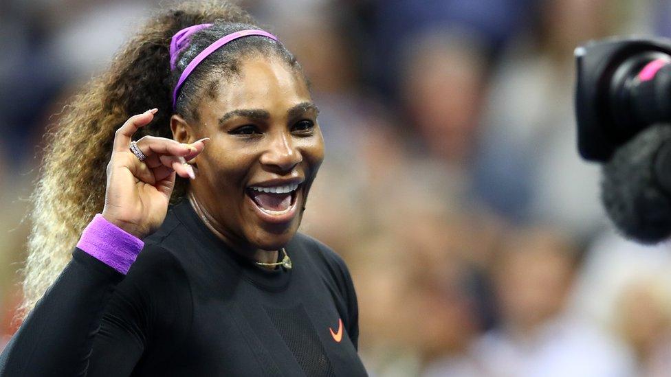 Serena Williams waves to camera