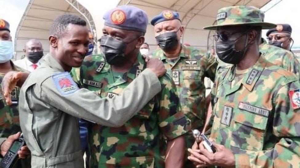 Flight Lieutenant Abayomi Dairo with the Chief of Air Staff, Air Marshal Oladayo Amao