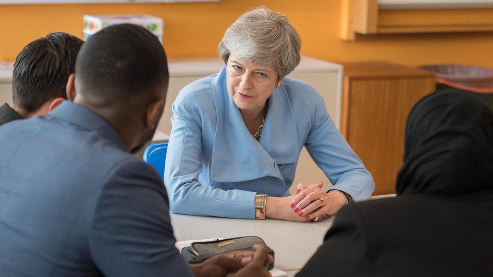 Theresa May speaks to pupils at Southfields school