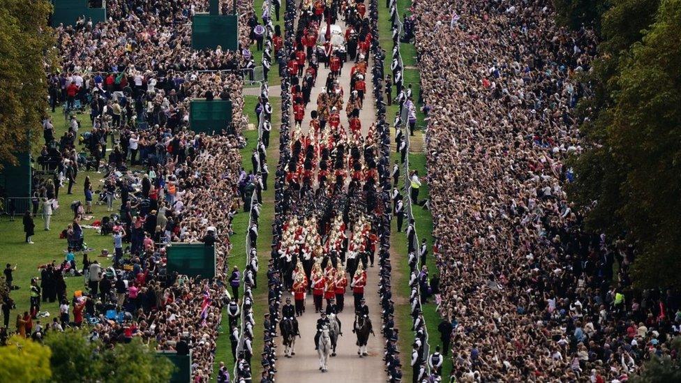 The Ceremonial Procession of the coffin of Queen Elizabeth II travels down the Long Walk