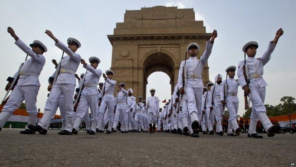 Indian soldiers leave after a ceremony to honor soldiers killed in action on occasion of 50th anniversary of India"s win over Pakistan in the war of 1965, at the India Gate war memorial in New Delhi, India, Friday, Aug. 28, 2015.