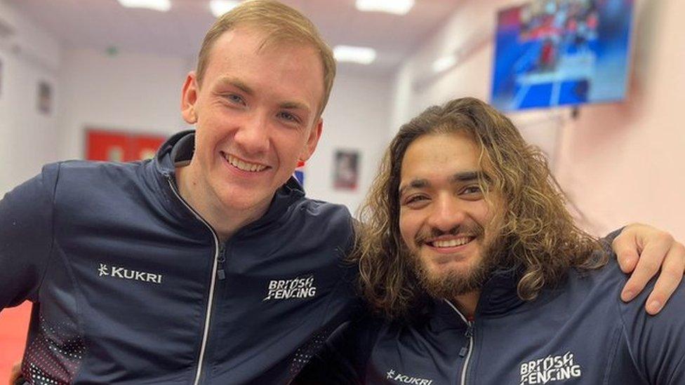 Two wheelchair fencers