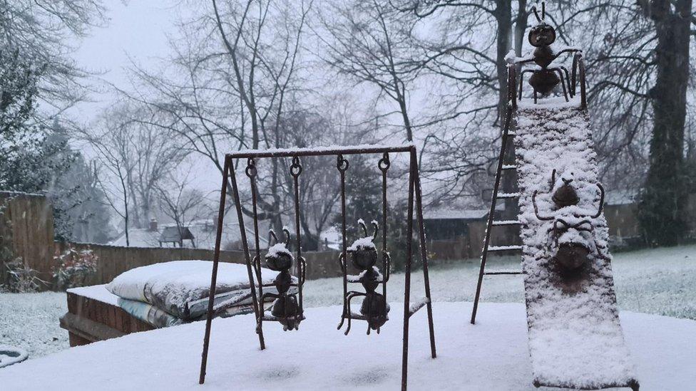 Snow on garden ornaments