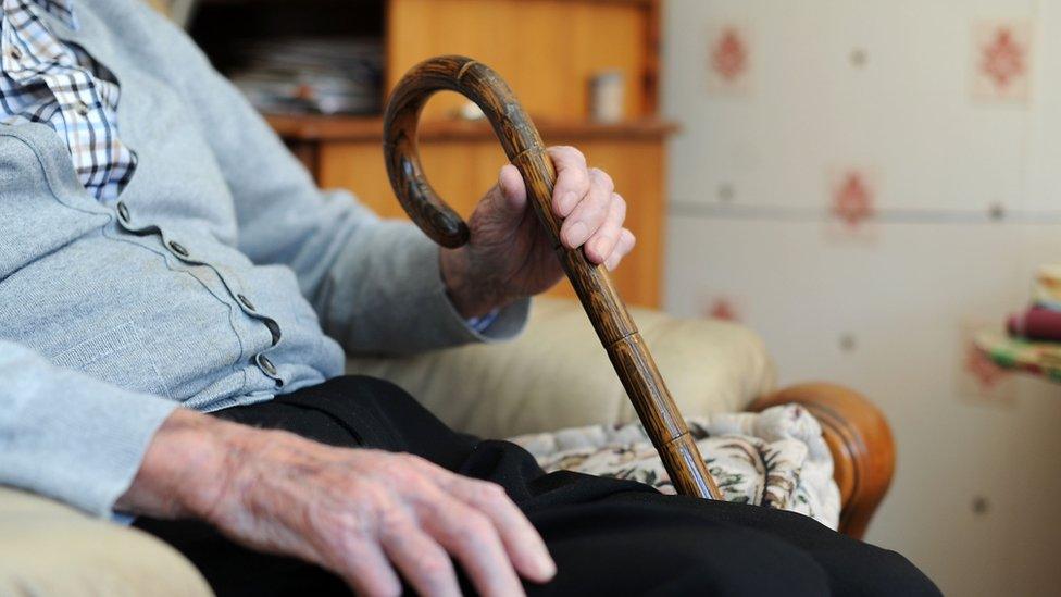 Elderly man in a chair