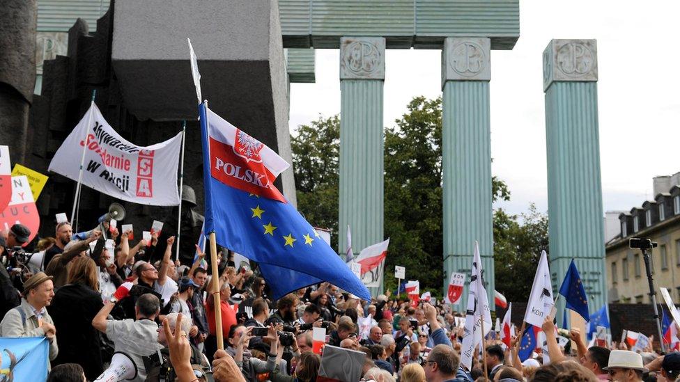 People gather in a protest organized by opponents of the judicial reform in front of the seat of the Supreme Court in Warsaw, Poland, 04 July 2018